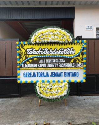 Papan Bunga Duka di Wara Timur
